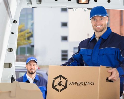 Long-Distance-USA-Movers-in-the-truck-with-boxes-Brand-1100x733